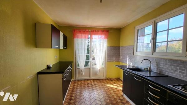 Dans un quartier résidentiel, pavillon sur 1420 m²