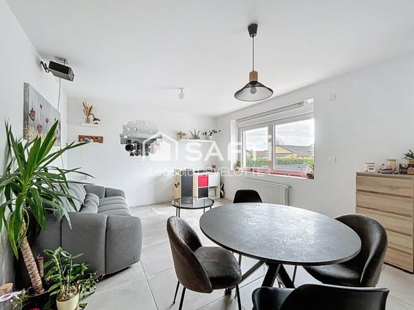 Superbe appartement avec jardin, cave et parking