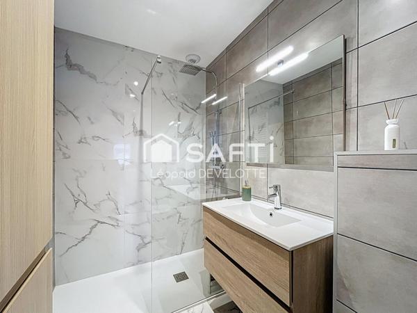 Superbe appartement avec jardin, cave et parking