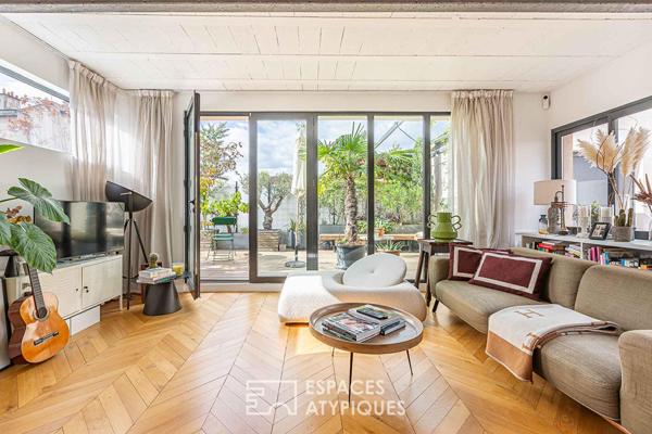 Appartement d’architecte avec terrasse arborée