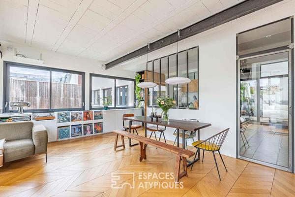 Appartement d’architecte avec terrasse arborée