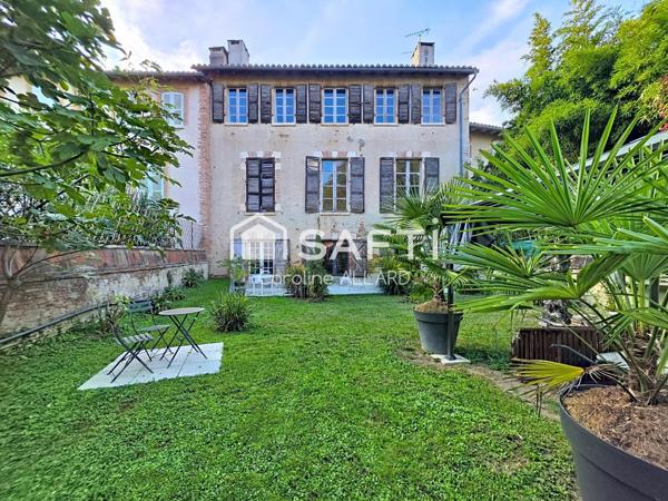 Demeure avec jardin en plein coeur du village