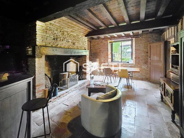 Demeure avec jardin en plein coeur du village