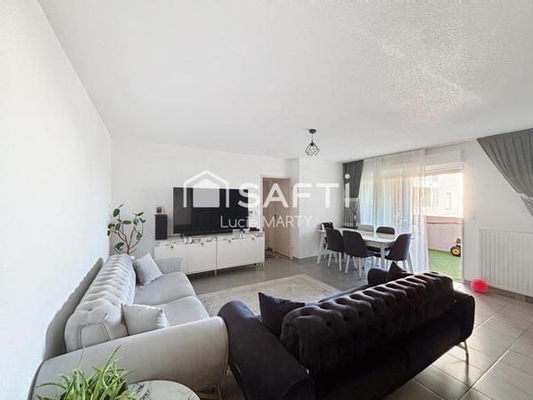 Appartement avec balcon, ascenseur et place de parking