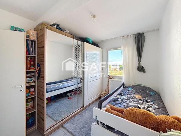 Appartement avec balcon, ascenseur et place de parking