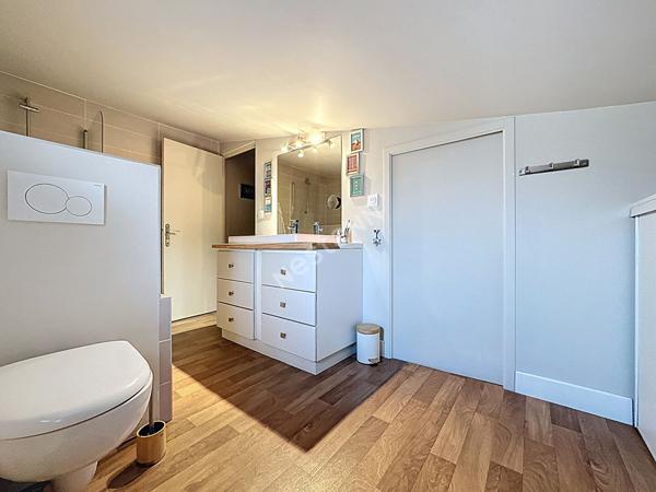 Maison de charme à vendre à Champtoceaux - 3 chambres, garage et extérieur.