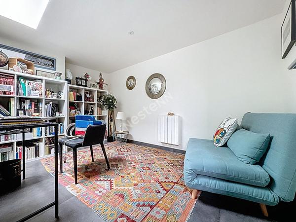 Maison de charme à vendre à Champtoceaux - 3 chambres, garage et extérieur.