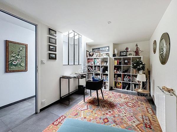 Maison de charme à vendre à Champtoceaux - 3 chambres, garage et extérieur.