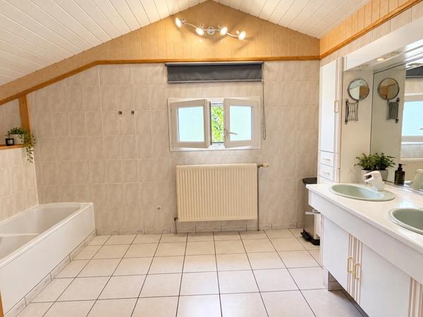 PAVILLON INDIVIDUEL SUR SOUS-SOL SEMI-ENTERRÉ