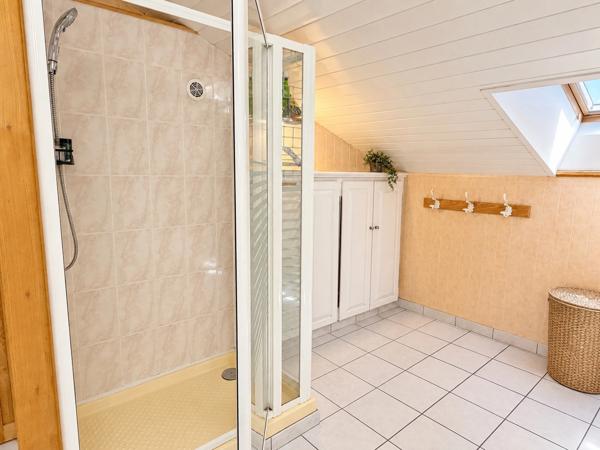 PAVILLON INDIVIDUEL SUR SOUS-SOL SEMI-ENTERRÉ