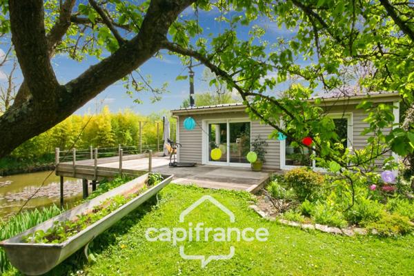 Proche SAINT-QUENTIN (02) : terrain de loisir 3200 m² au bord de l’Oise avec Chalet et potentiel locatif