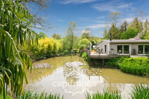 Proche SAINT-QUENTIN (02) : terrain de loisir 3200 m² au bord de l’Oise avec Chalet et potentiel locatif