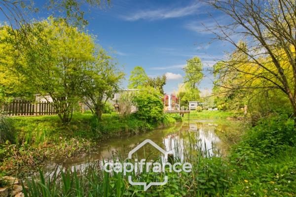 Proche SAINT-QUENTIN (02) : terrain de loisir 3200 m² au bord de l’Oise avec Chalet et potentiel locatif