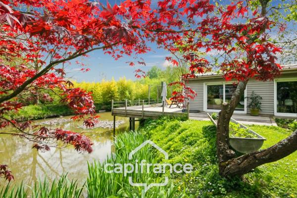 Proche SAINT-QUENTIN (02) : terrain de loisir 3200 m² au bord de l’Oise avec Chalet et potentiel locatif