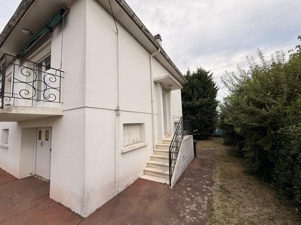 MAISON SUR SOUS-SOL AVEC JARDIN