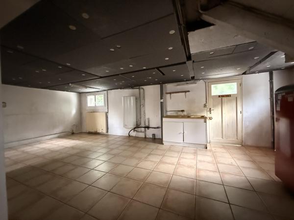 MAISON SUR SOUS-SOL AVEC JARDIN