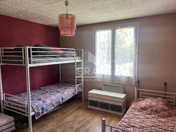 Maison plain-pied de 5 pièces de 111 m² à AOSTE (38)