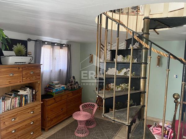Maison plain-pied de 5 pièces de 111 m² à AOSTE (38)