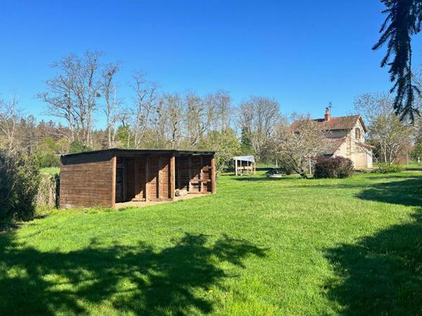 Maison avec terrain + puits + cave