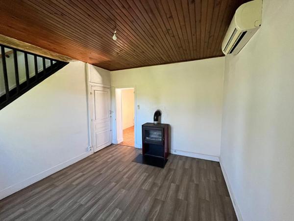 Maison avec terrain + puits + cave