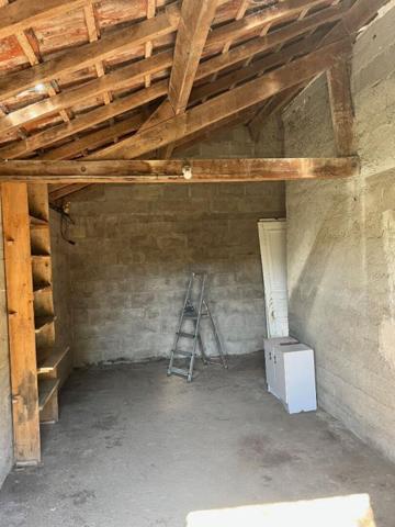 Maison avec terrain + puits + cave