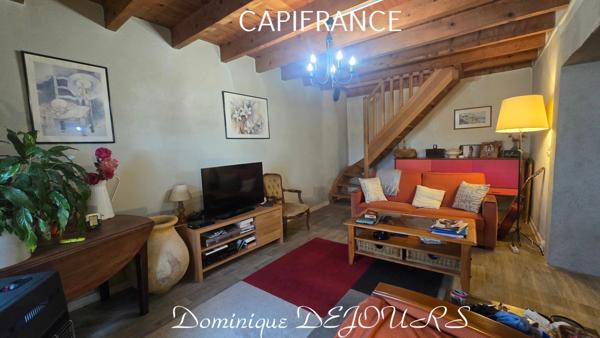 Proche d'Albon d'Ardèche dans la vallée de la Glueyre, maison de 95m² avec un garage, terrasse et terrain