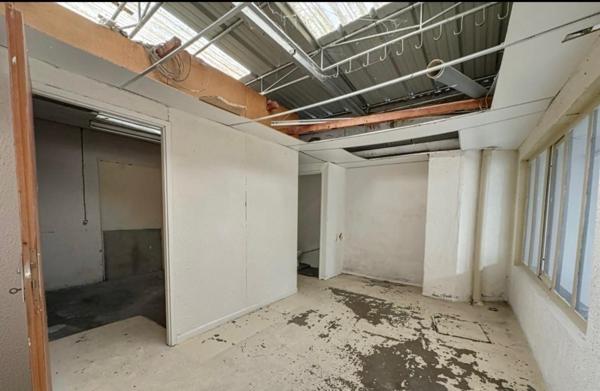 Immeuble en centre ville avec Local loué