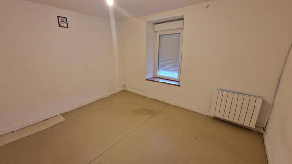 Maison divisée en 2 appartements