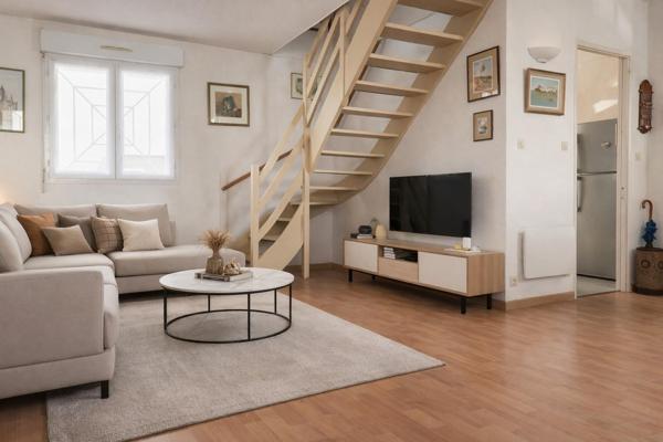 Appartement T3 lumineux avec 2 points d'eau et 2 places de parking