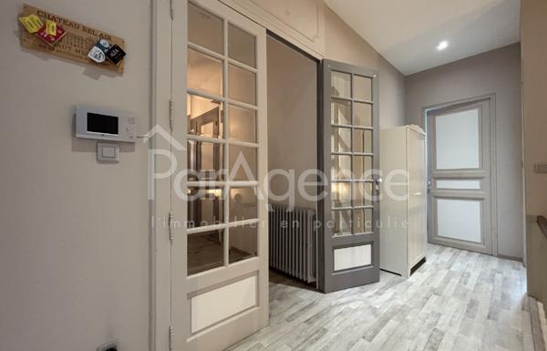 Appartement Dernier étage avec garage centre-ville