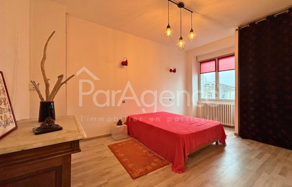 Appartement Dernier étage avec garage centre-ville