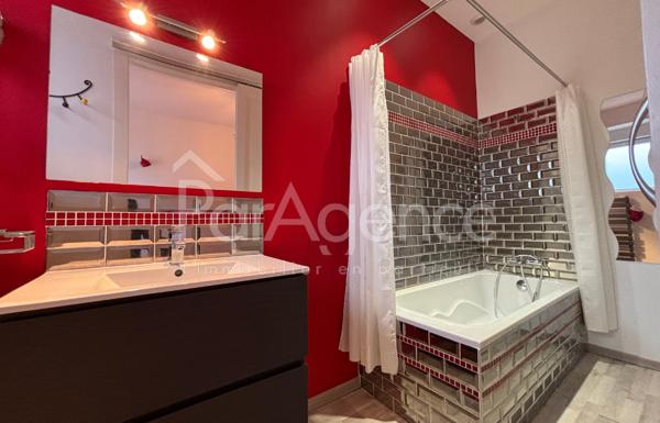 Appartement Dernier étage avec garage centre-ville