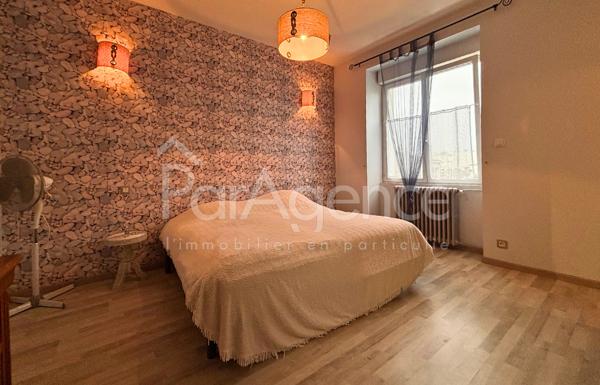 Appartement Dernier étage avec garage centre-ville