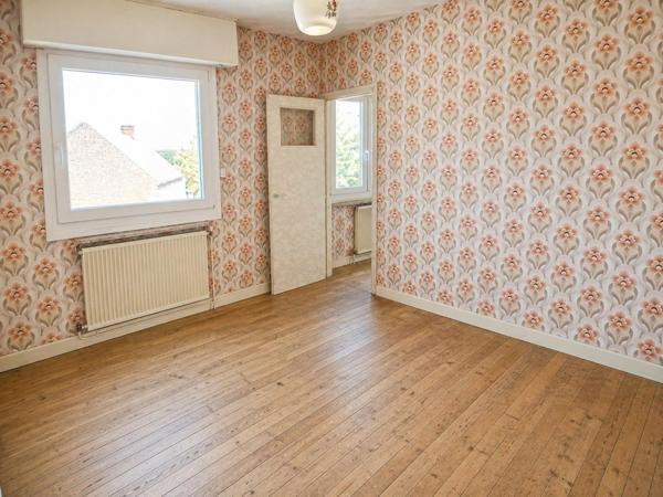 MAISON SEMI-INDIVIDUELLE AVEC GARAGE, JARDIN & FORT POTENTIEL