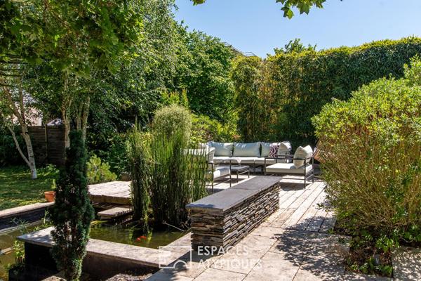 L’élégante demeure de charme et son jardin paysager