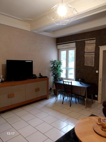 Immeuble avec fonds de commerce et appartement