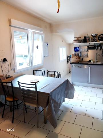 Immeuble avec fonds de commerce et appartement