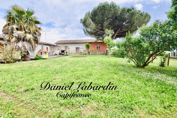 PLAIN PIED - 3 CHAMBRES - Garage - Jardin