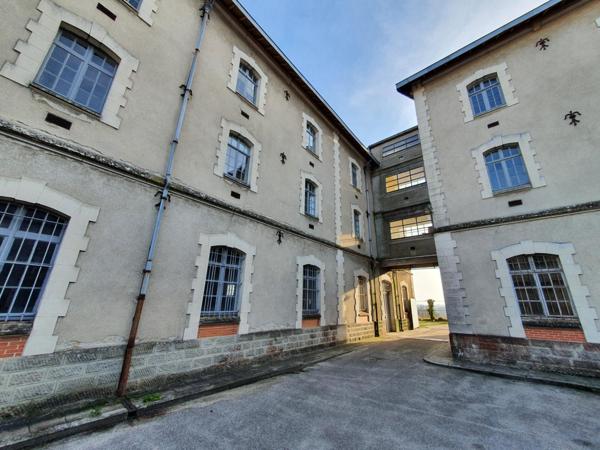 Grand ensemble immobilier de 8000m2 découpable en appartements + parking