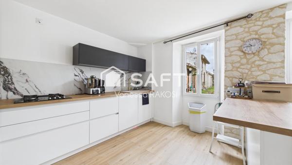 Maison familiale rénovée avec 3 chambres, jardin clos.