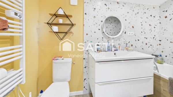 Maison familiale rénovée avec 3 chambres, jardin clos.