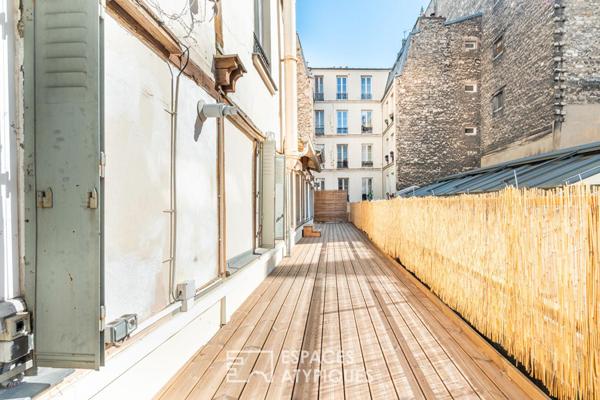 Loft avec terrasse plein Sud Est à proximité du Canal st Martin et du Bassin de la Villette
