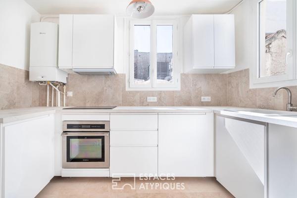 Loft avec terrasse plein Sud Est à proximité du Canal st Martin et du Bassin de la Villette