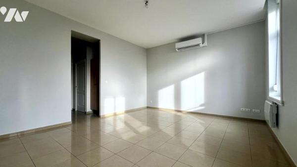 Appartement en rez-de-chaussée avec parking