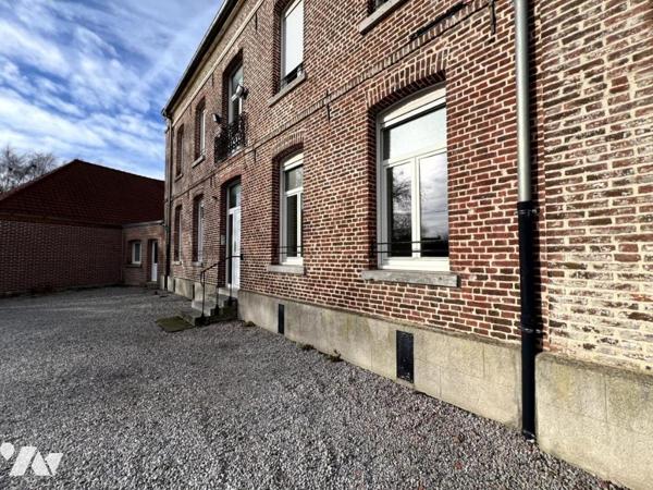Appartement en rez-de-chaussée avec parking