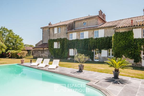 Élégante maison de maître avec son parc arboré et sa piscine