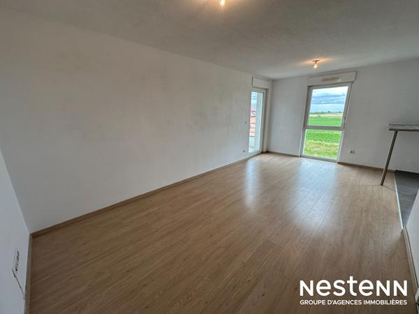 Coup de coeur assuré : appartement lumineux avec balcon, parking et vues exceptionnelles sur la Forêt-Noire et Strasbourg