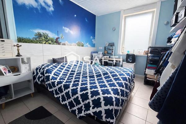 Maison familiale 100 m² avec véranda et jardin