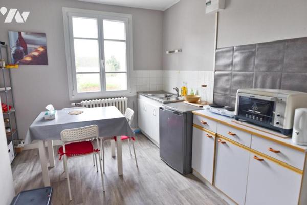 Maison de ville centre ville rive Gauche, proximité Gare, école et commerces.