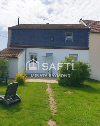 maison d'environ 137 mètre carré  proche du  centre ville avec terrasse et terrain